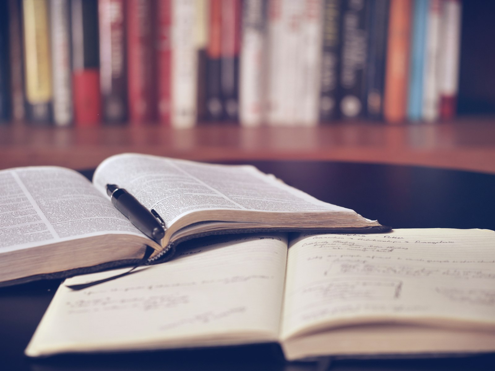 Open books on a library desk